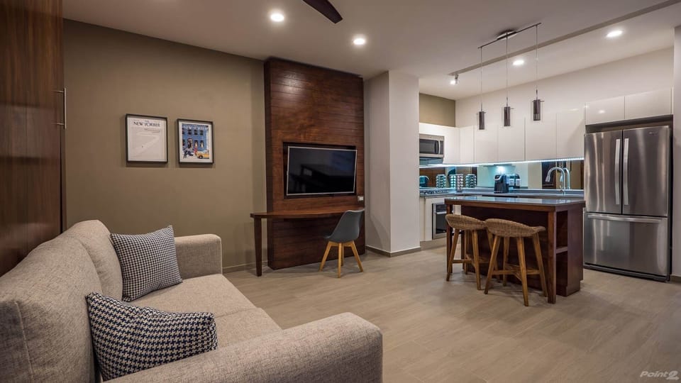 The space opens up with the Murphy bed tucked away