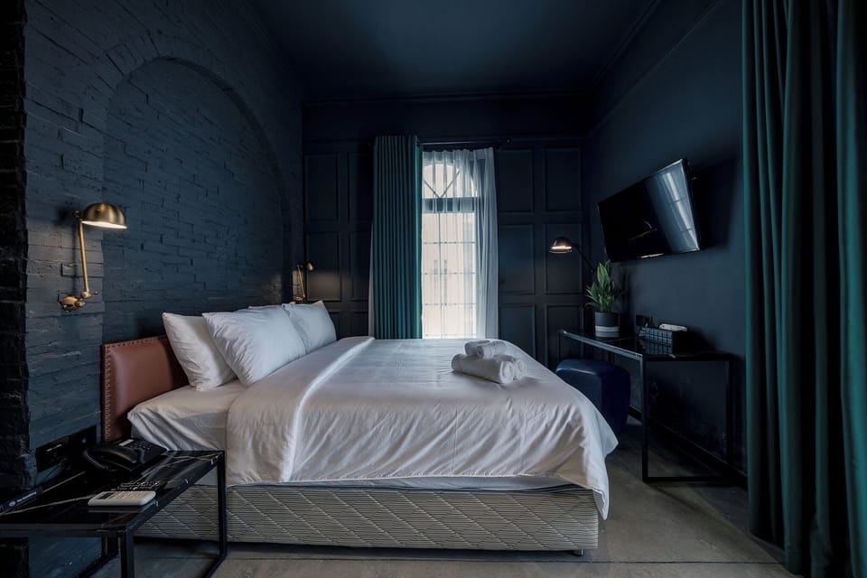 Deluxe Double Room, Bathtub, City View | Blackout drapes, free WiFi, bed sheets