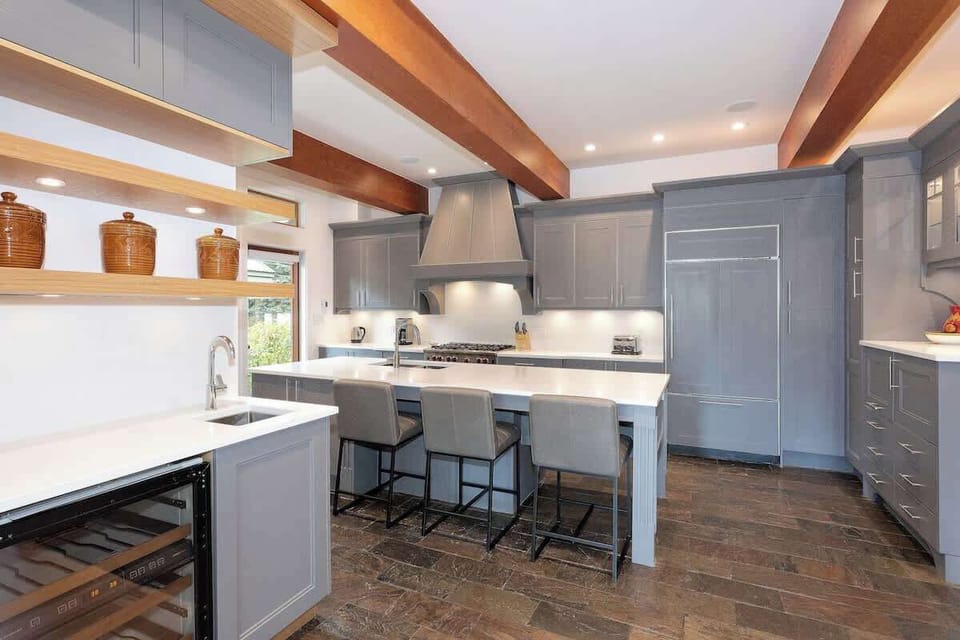 - Chef-inspired kitchen with built-in appliances and seating bar  
- Ample workspace and stylish finishes for effortless cooking  
- Perfect for preparing meals before cozy evenings by the fire  