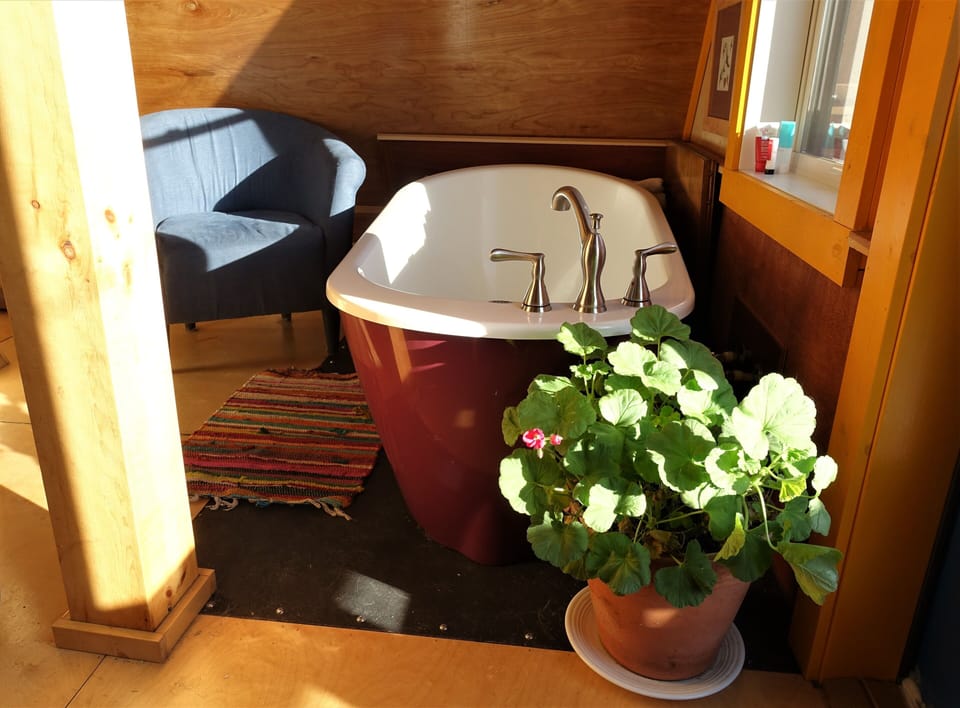 Relax in the cabin's centerpiece - a deep soaker tub