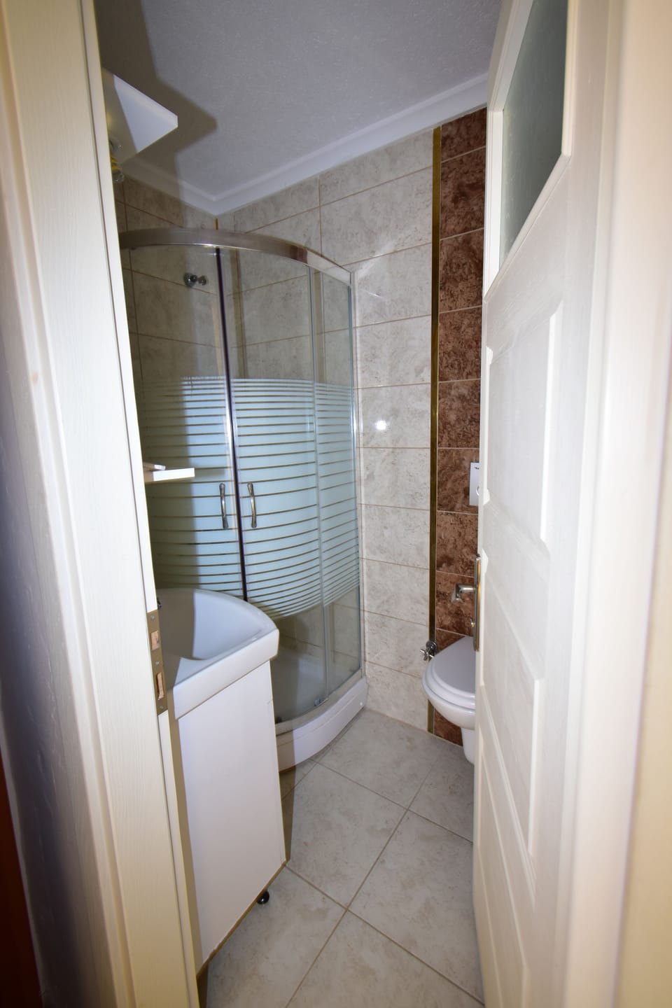 Shower, free toiletries, hair dryer, slippers