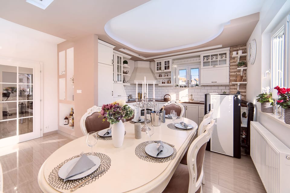 6 person dining room and kitchen connected to the living room 