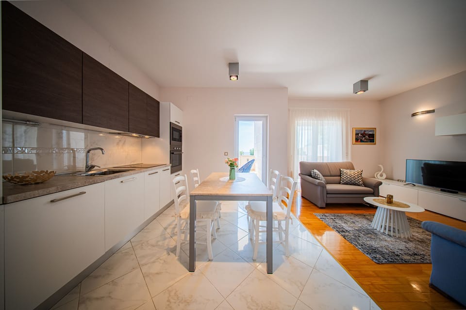 Apartment (A2) | Private kitchen | Fridge, microwave, oven, stovetop