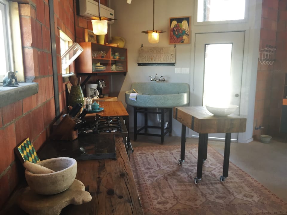 Chopping block table serves as dining table as well as food preparation area