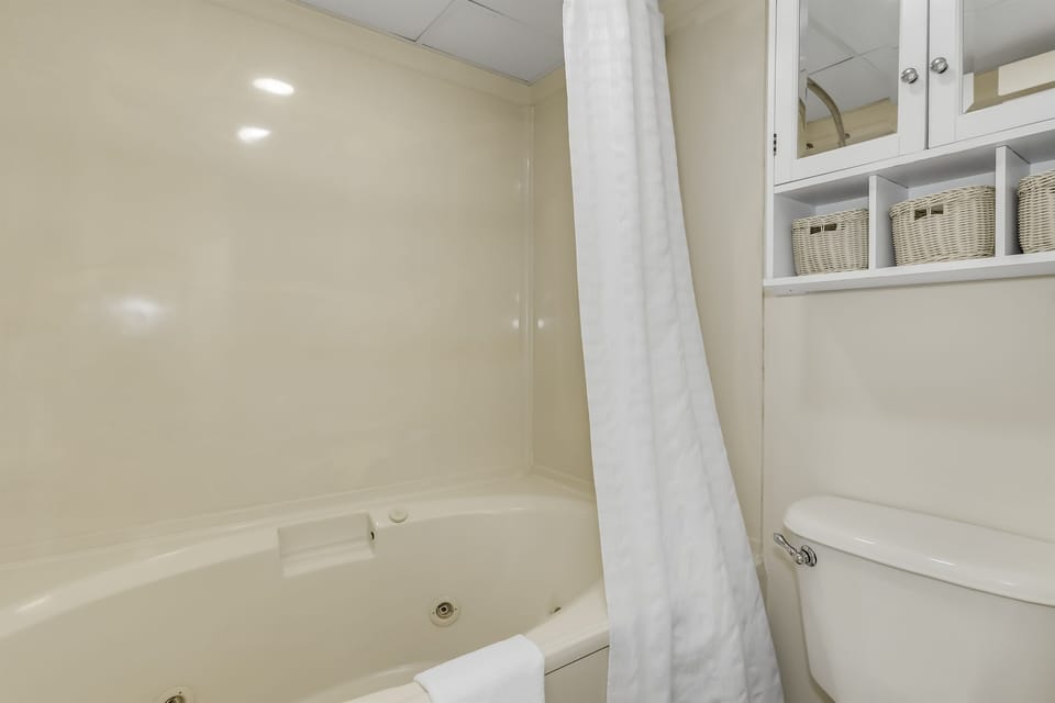 Step into your own private oasis within our full bathroom
