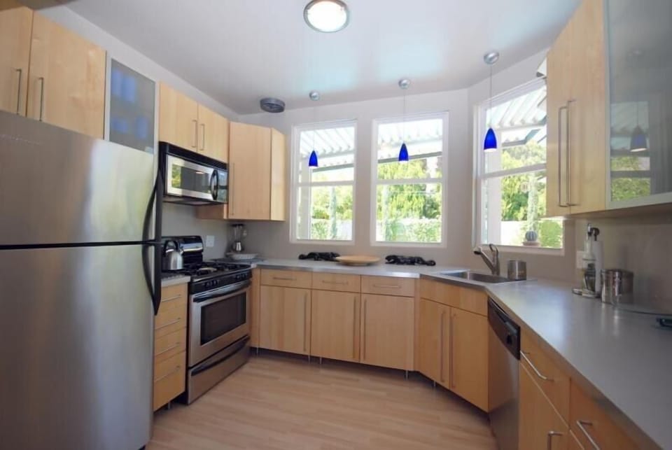 A cook's dream overlooking the pool!