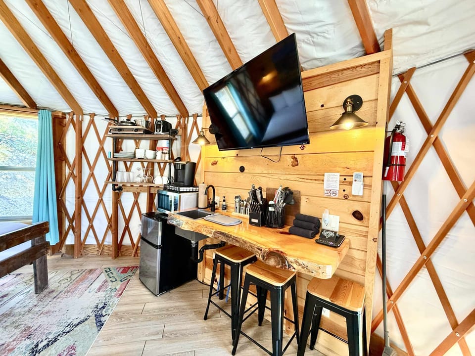 Yurt 3 Flatscreen TV and sitting area