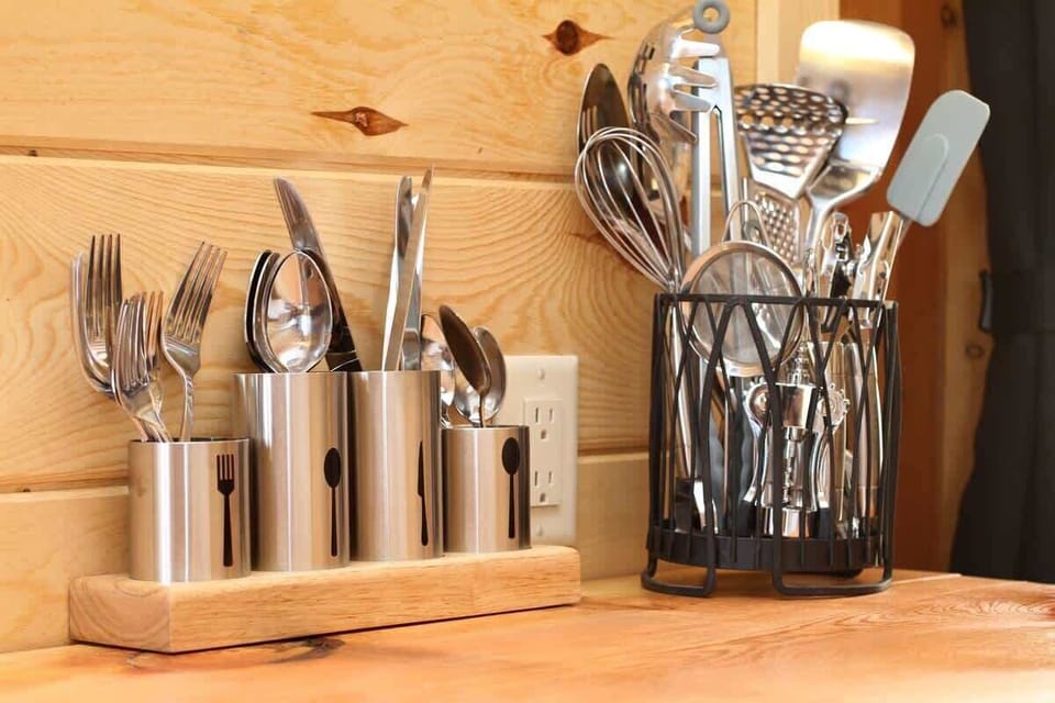 Well-stocked kitchenette inside your yurt with utensils, kitchenware, and essentials for preparing simple meals during your East Zion Resort stay.