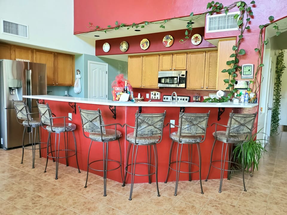 Kitchen bar are seating for 6.