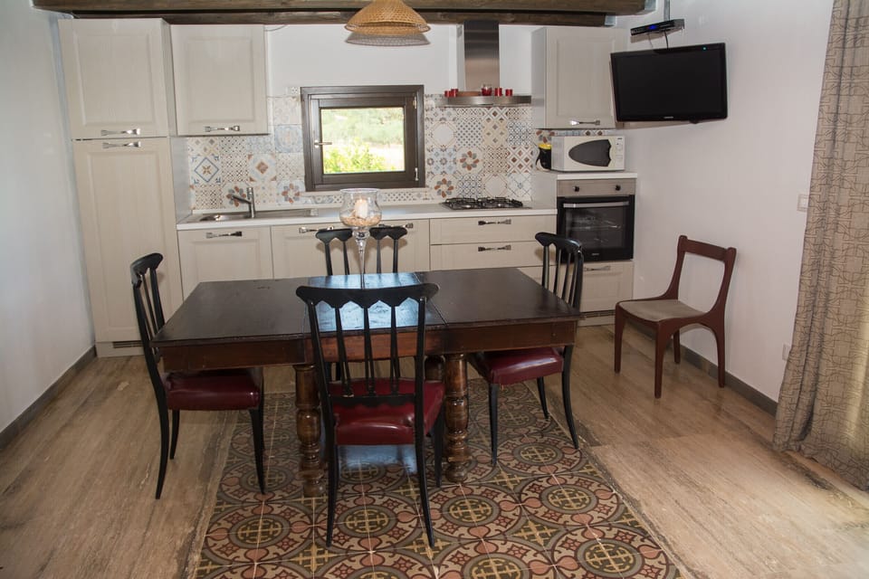 Scopello, dining room with tv
