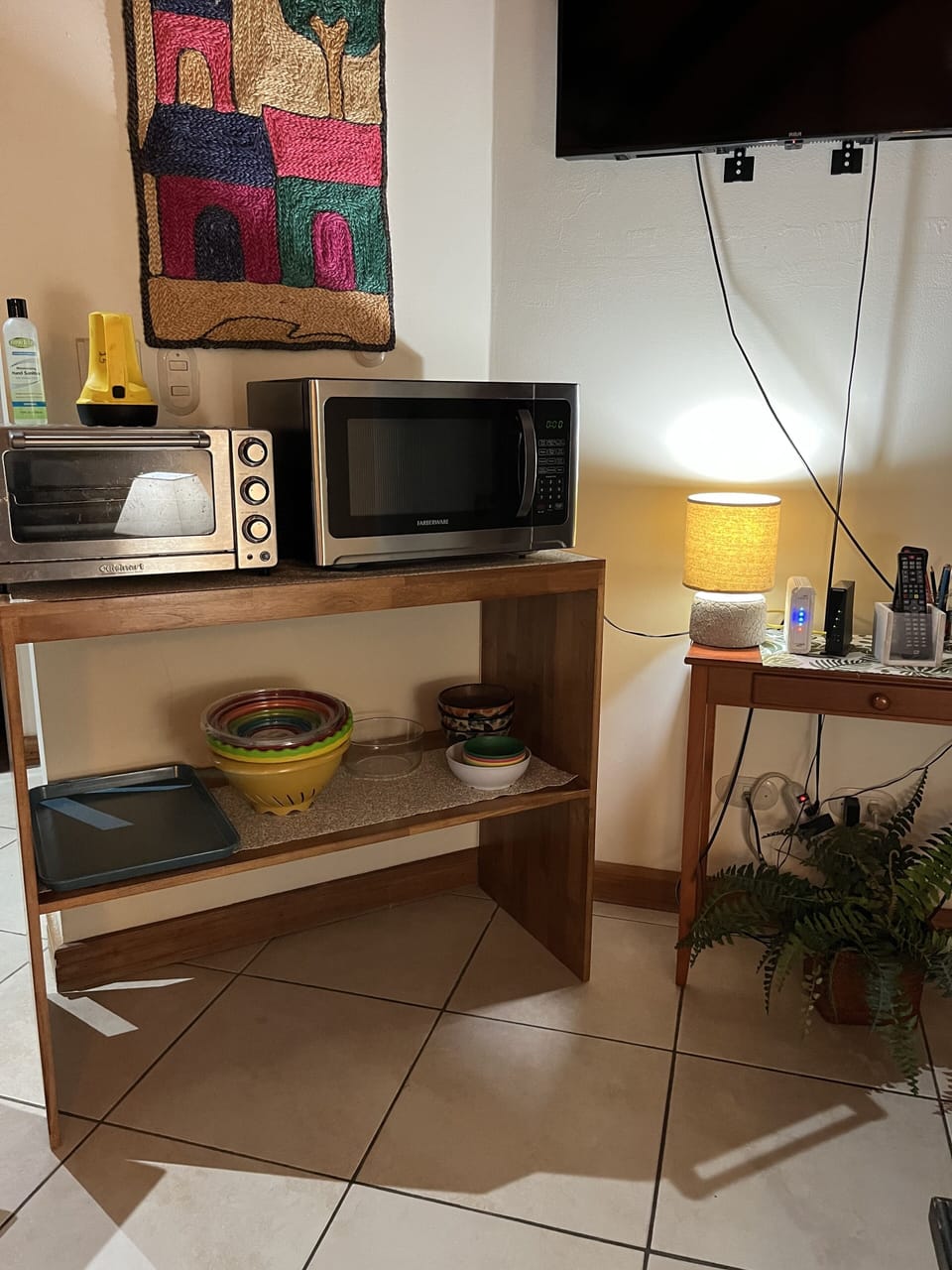 Toaster Oven and microwave with supplies for your convenience 