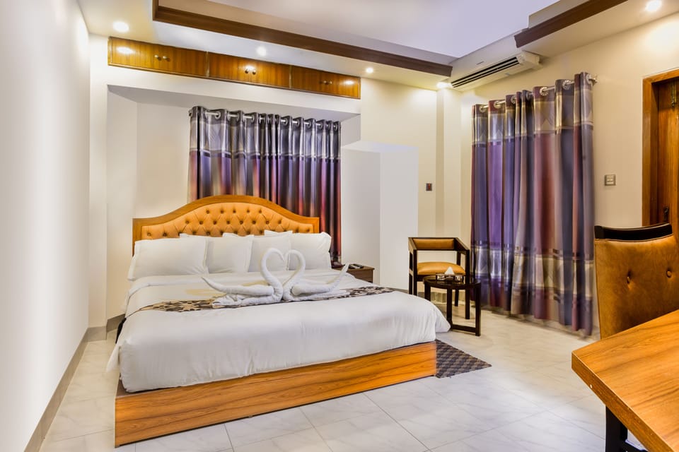 Blackout drapes, soundproofing, free WiFi, bed sheets