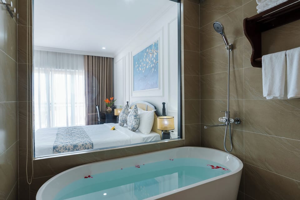 Premier Double Room | Bathroom | Designer toiletries, hair dryer, bathrobes, slippers