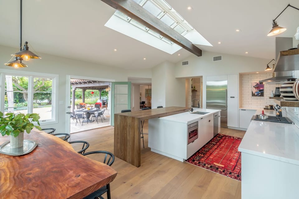 Open windows and doors to let the coastal breezes in