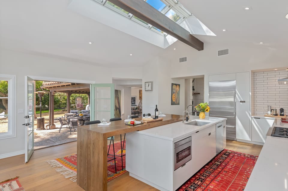 Custom skylights and and eat-in bar area ensure light and functionality