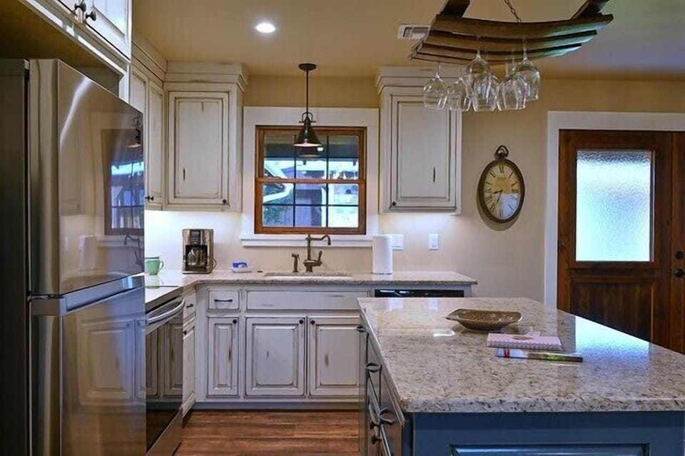 Kitchen with stove, microwave, oven, and coffee pot!