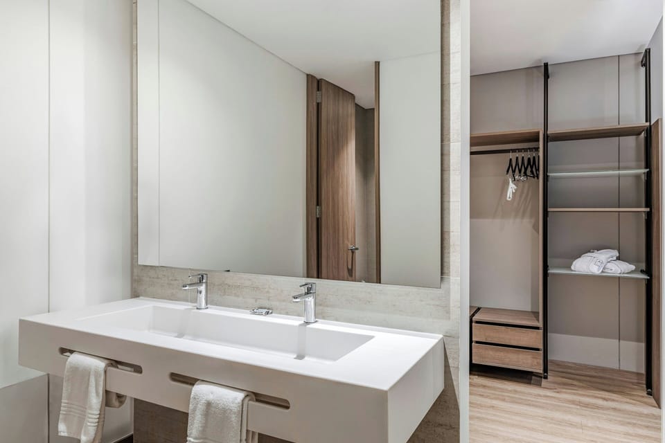 Suite, 1 Bedroom | Bathroom | Shower, free toiletries, hair dryer, towels