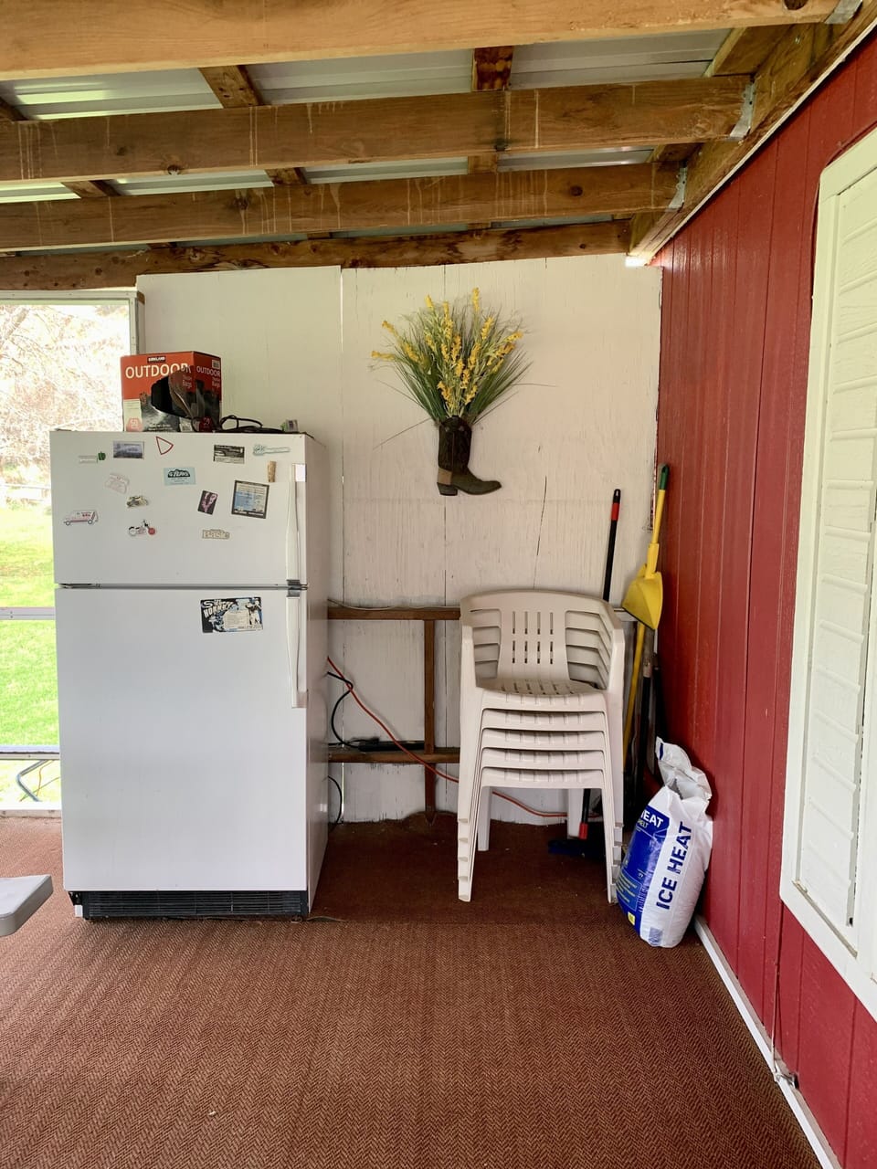 Outdoor refrigerator on the screened in porch 
