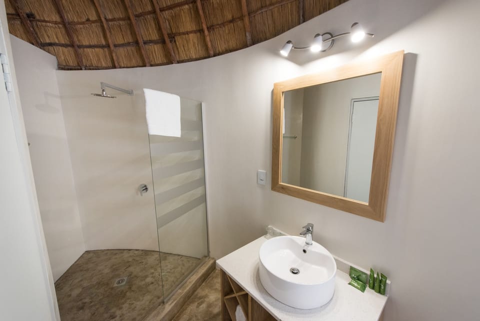 Superior Zulu Hut | Bathroom | Free toiletries, hair dryer, towels
