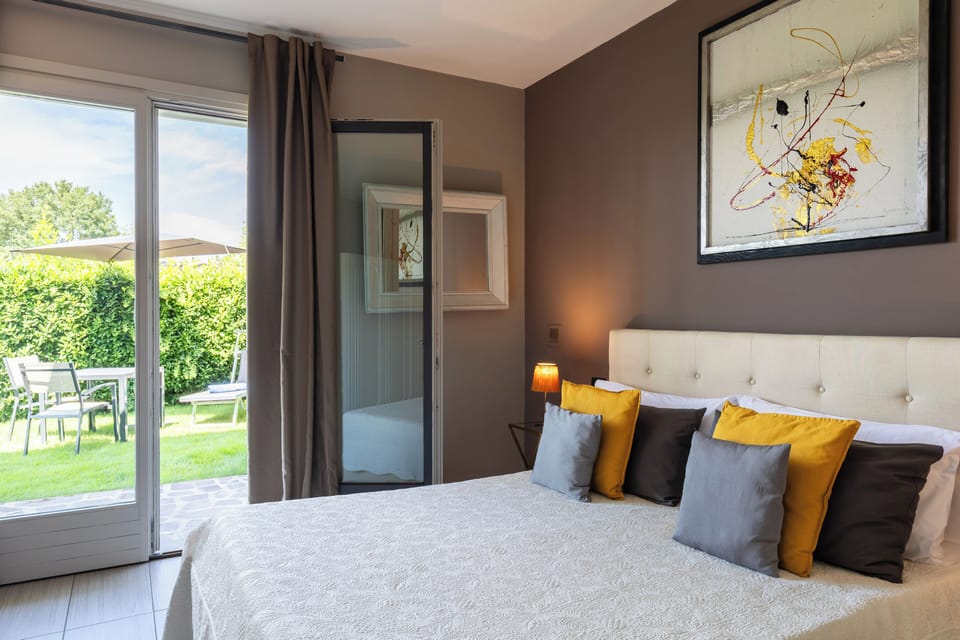 DESIGN FAMILY | Frette Italian sheets, down comforters, individually decorated