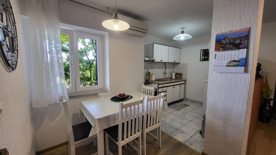 Apartment (A1) | Private kitchen | Fridge, microwave, stovetop, coffee/tea maker