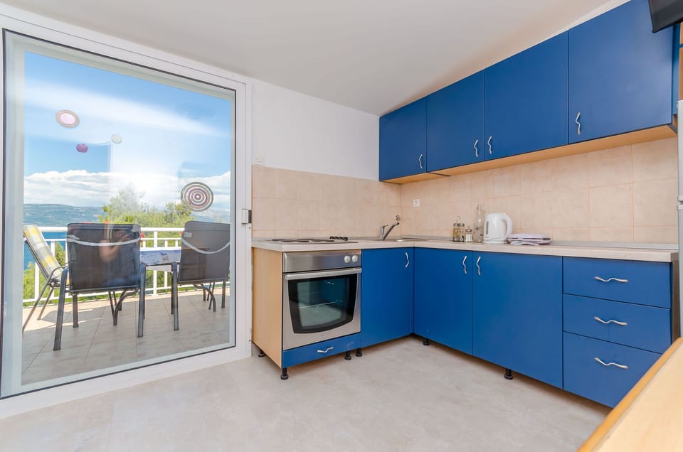 Apartment (A1) | Private kitchen | Espresso maker, coffee/tea maker, fridge, oven