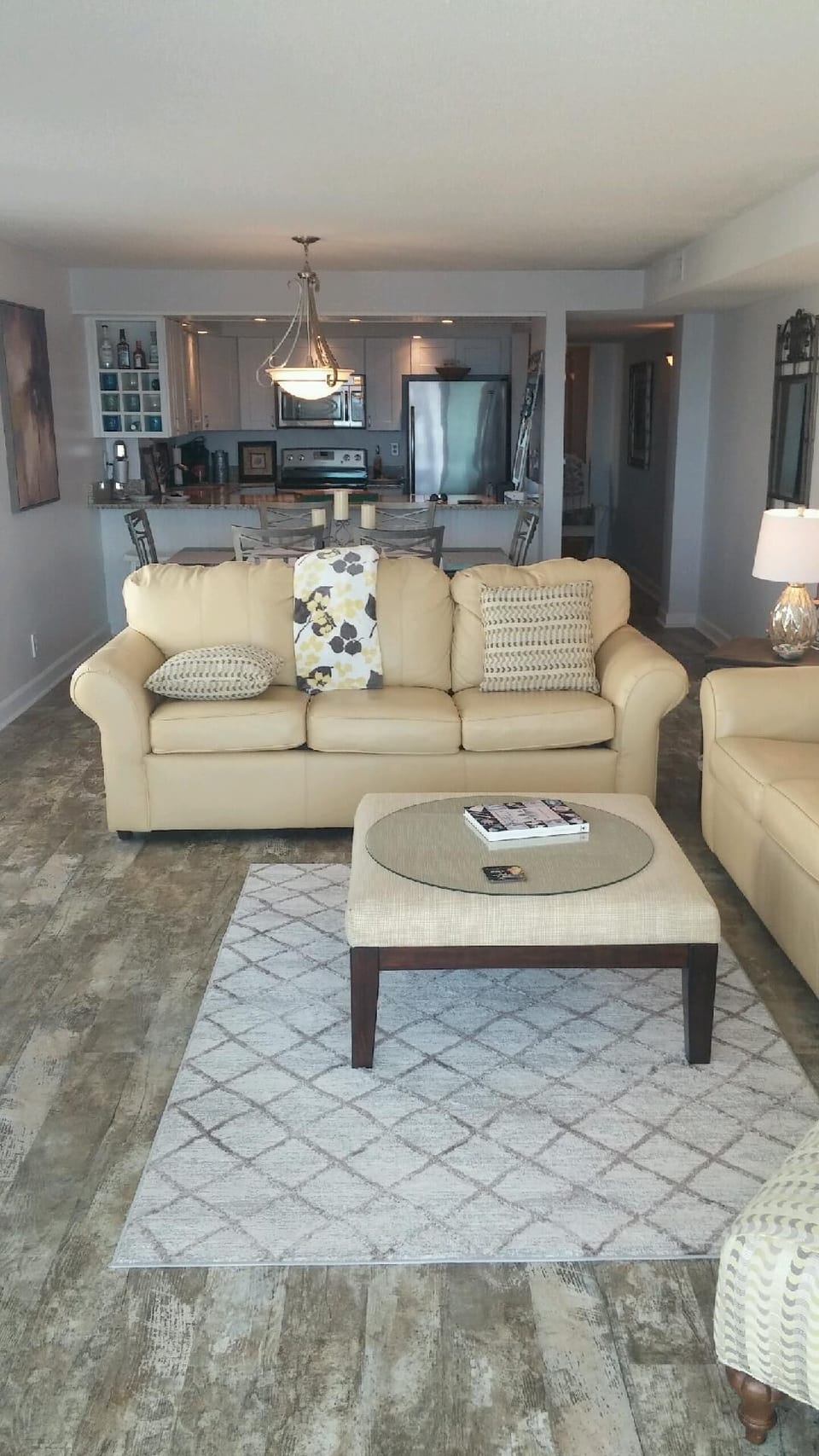 Lovely buttercup yellow sofas, two full size sofas.