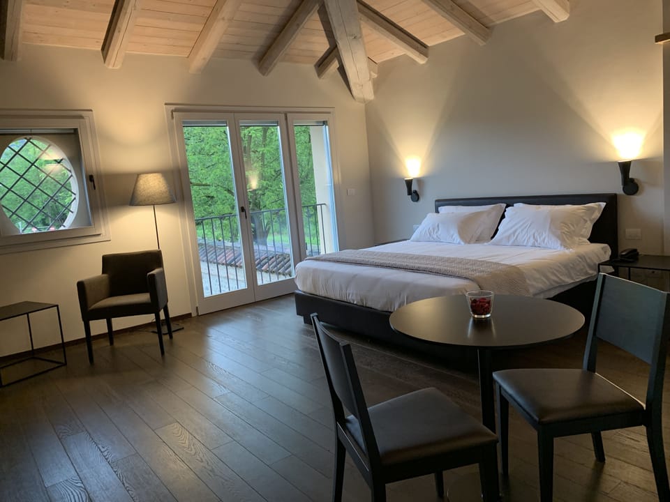Grand Room | Premium bedding, down comforters, pillowtop beds, soundproofing