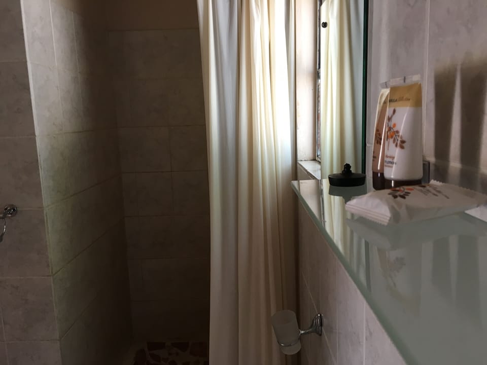 Deep soaking tub, rainfall showerhead, free toiletries, towels