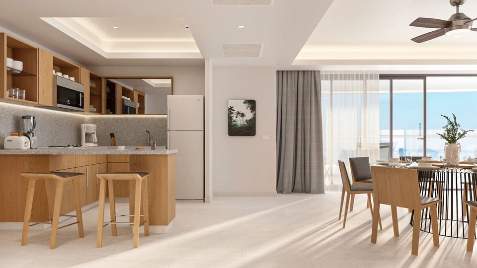 Sunset Suite Ocean Front | Private kitchen | Cookware/dishes/utensils