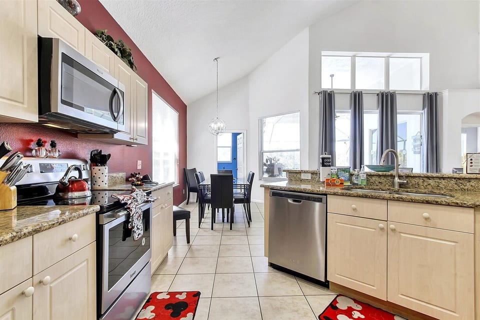 Open floor plan extends to private outdoor deck with fully screened lanai!
