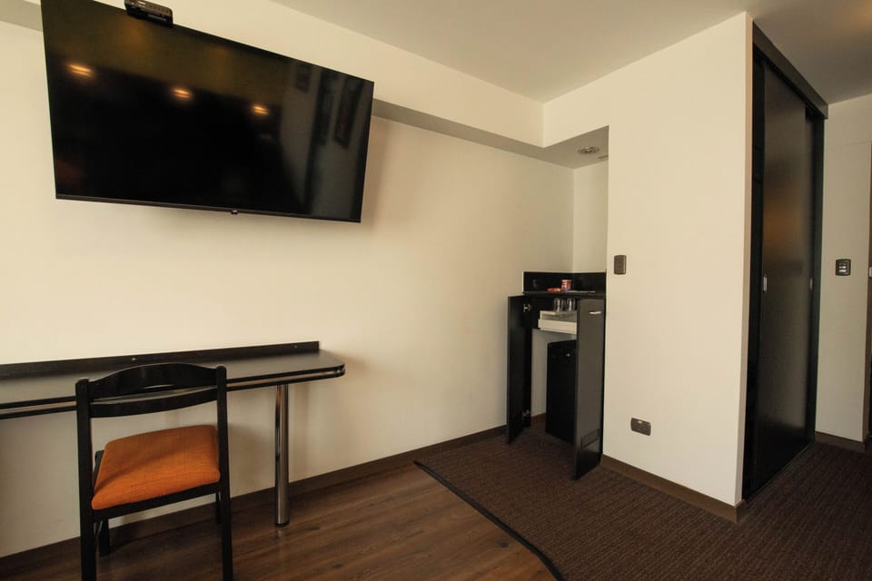 Suite, 1 Queen Bed | Minibar, in-room safe, desk, laptop workspace