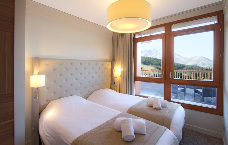 There's either 2 Single beds or Bunks in the second bedroom. Views will vary.
