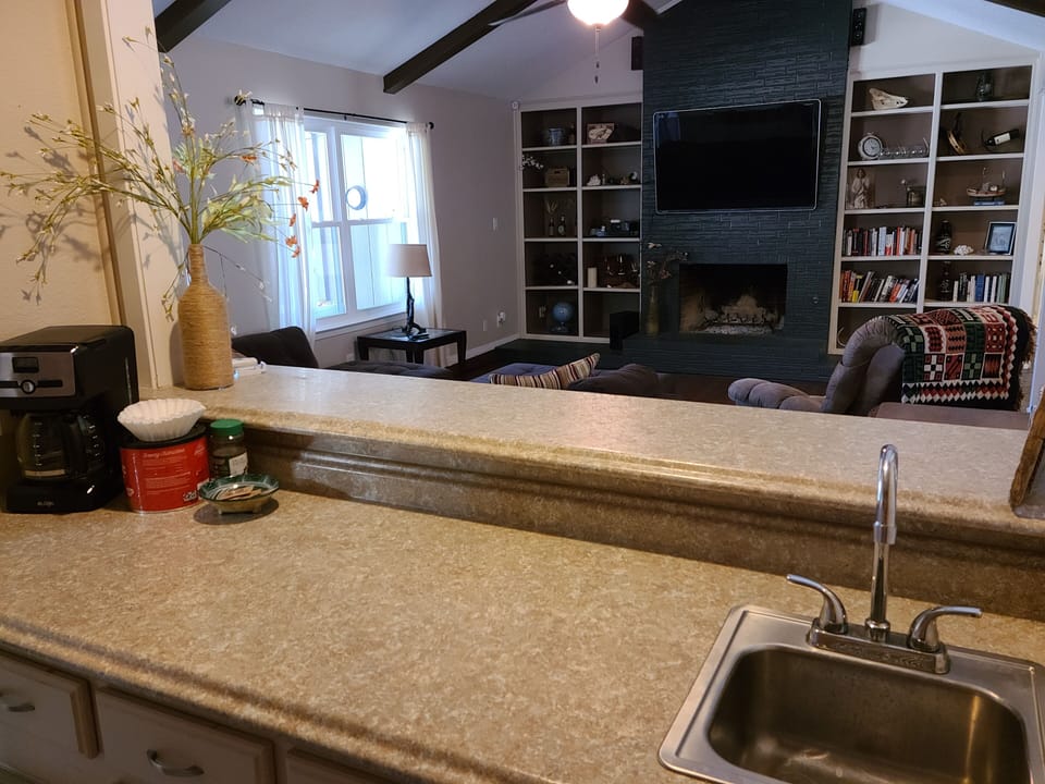 Coffee Bar overlooking living room & pool/patio
