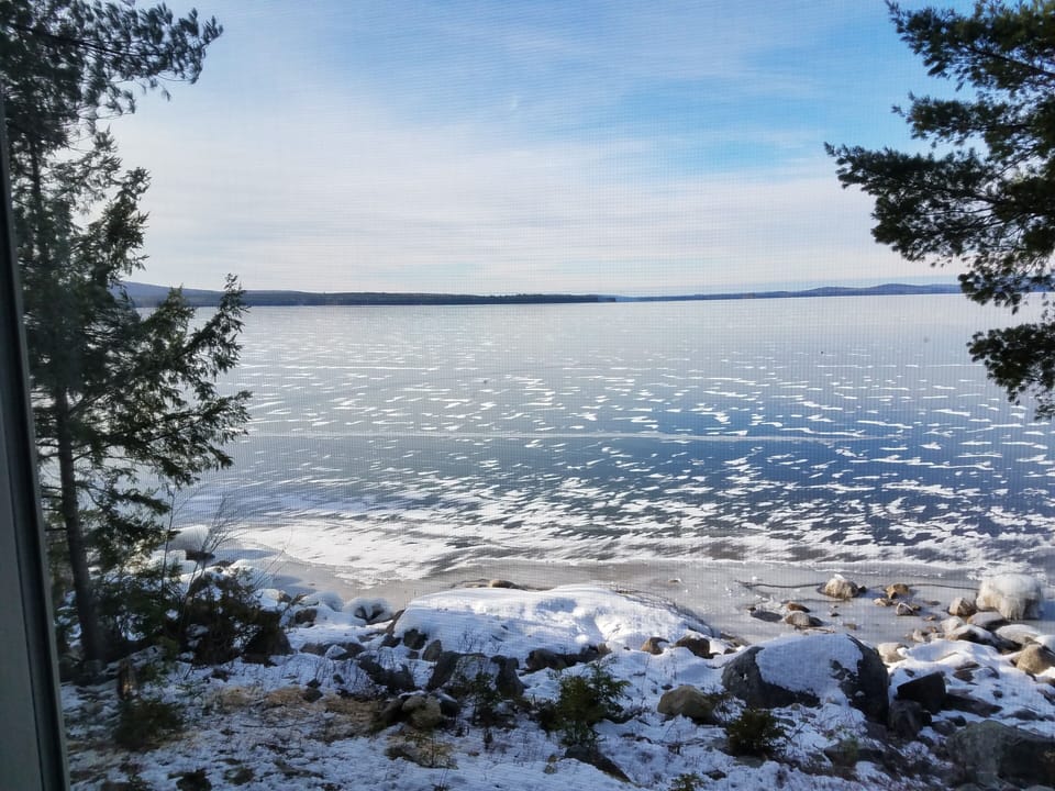 Winter scene from the camp overlooking beautiful clear ice. 