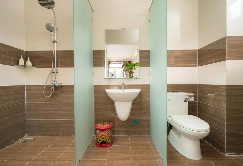 Shower, free toiletries, hair dryer, slippers