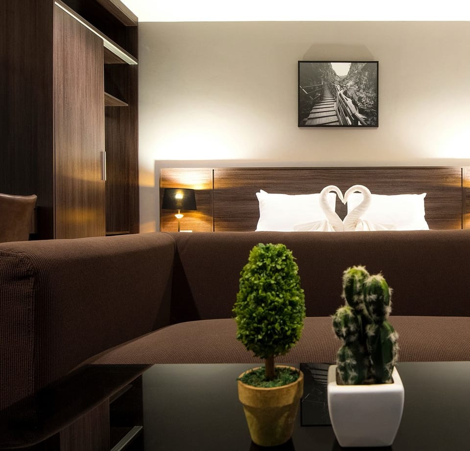 Superior Double Room | Living area | Flat-screen TV