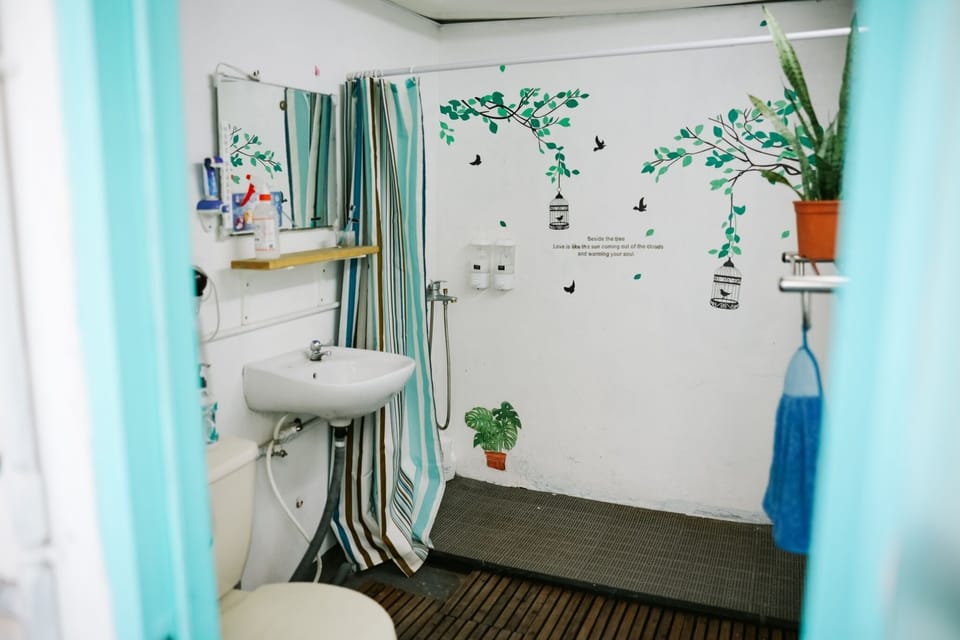 Shared Dormitory, Female Dormitory, Shared Bathroom | Bathroom | Shower, rainfall showerhead, slippers