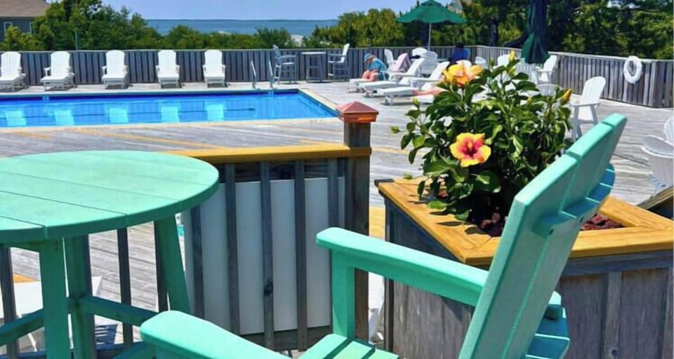 Picture yourself lounging poolside with ocean views—your perfect backdrop for sunny mornings and relaxed afternoons. Grab your favorite seat, soak up the warmth, and let the coastal breeze refresh you.