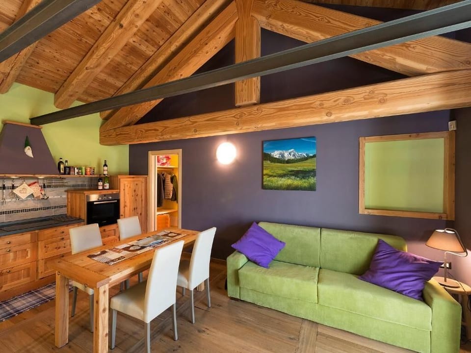 Apartment, 1 Bedroom (Il Melo) | Living area | LED TV, heated floors