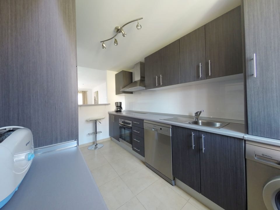 Large kitchen with sleek appliances