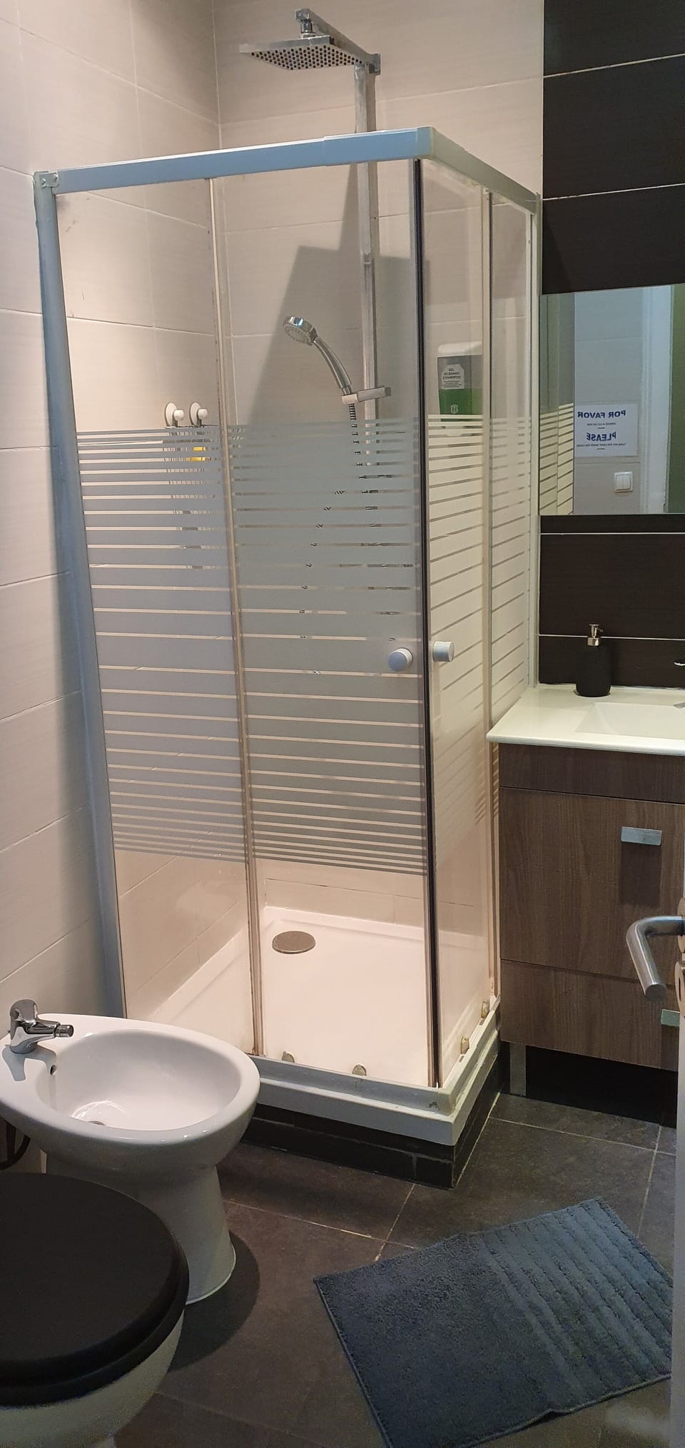 Shower, rainfall showerhead, hair dryer, towels