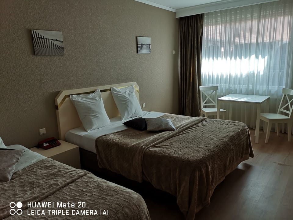 Classic Triple Room | 1 bedroom, minibar, desk, blackout drapes