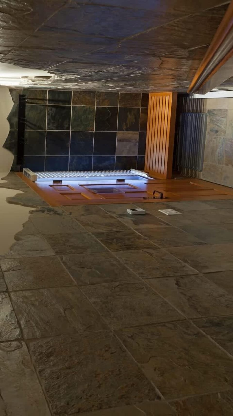- Whistler mudroom entry with rustic stone wall and bench  
- Perfect place to remove ski gear after mountain adventures  
- Designed for practical comfort and cozy homecoming  