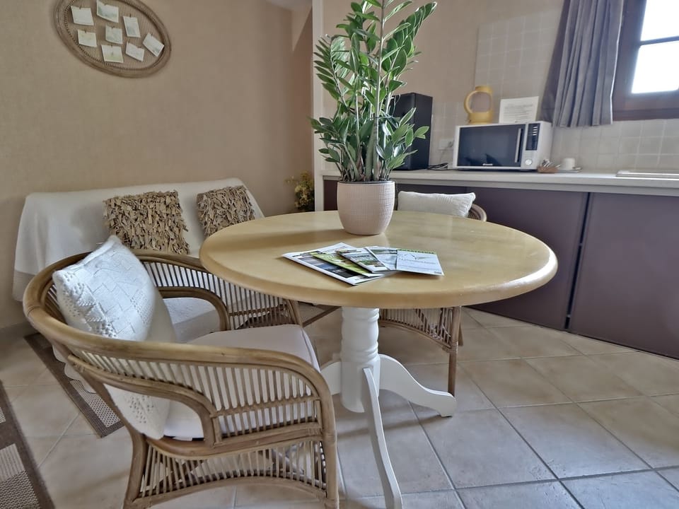 Junior Double Room | Living area | Flat-screen TV