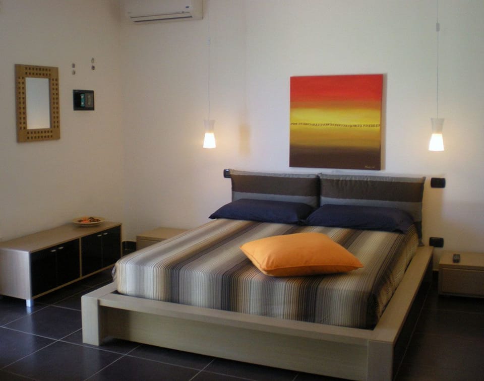 Studio, Kitchenette, Ground Floor | Minibar, in-room safe, individually furnished, blackout drapes