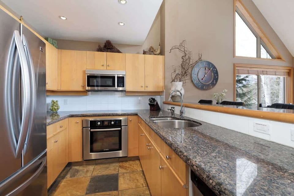 Contemporary kitchen with stainless steel appliances