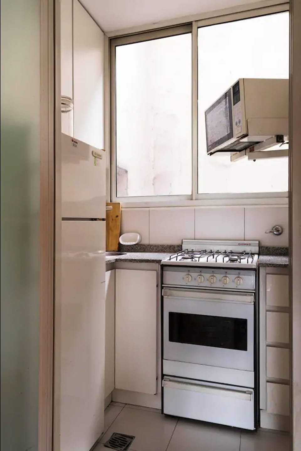 Design Apartment, Garden View | Private kitchen | Fridge, microwave, cookware/dishes/utensils, cleaning supplies