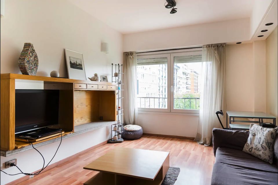 Design Apartment, Garden View | Living area | Flat-screen TV