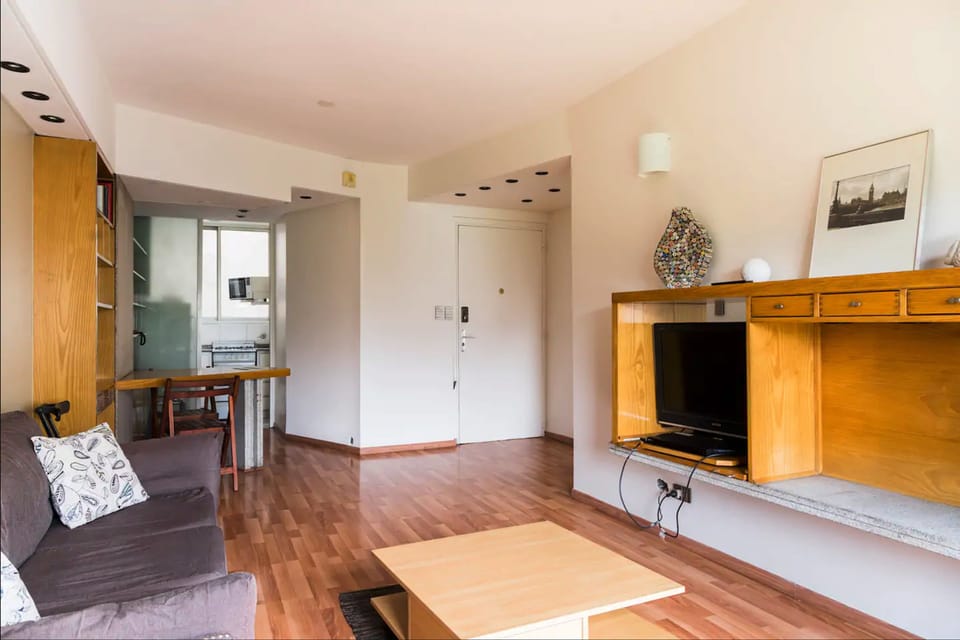 Design Apartment, Garden View | Living area | Flat-screen TV